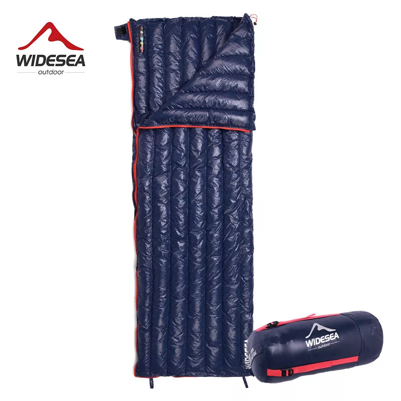 A camping enthusiast zipping up a portable, lightweight, yet warm Down Sleeping Bag that is perfectly designed for winter camping. This Sleeping Bag, filled with luxurious duck down and wrapped in a durable nylon fabric, offers both functionality and comfort, ideal for camping trips or backpacking adventures. The bag offers the possibility of splicing to accommodate two people, perfect for a night under the star-lit sky.