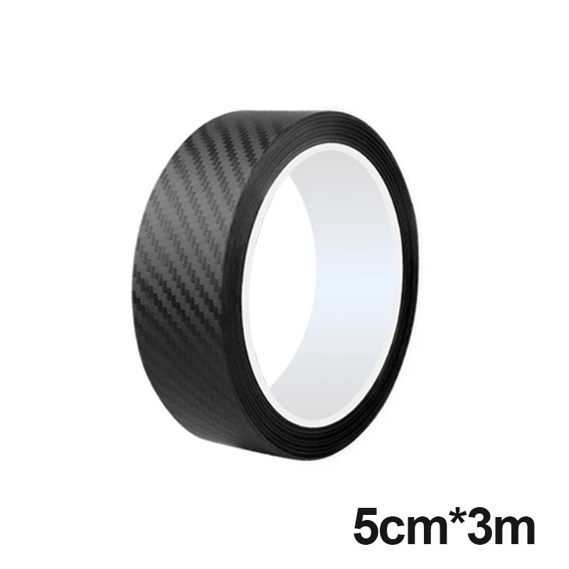Carbon fiber car sticker with anti-scratch properties and waterproof design, suitable for doors, thresholds, hoods, trunks, and car bodies. Available in various widths: 3cm, 5cm, and 7cm. Length: 3 meters. Easy to cut, install, and wash. Leaves no trace on the car's surface.