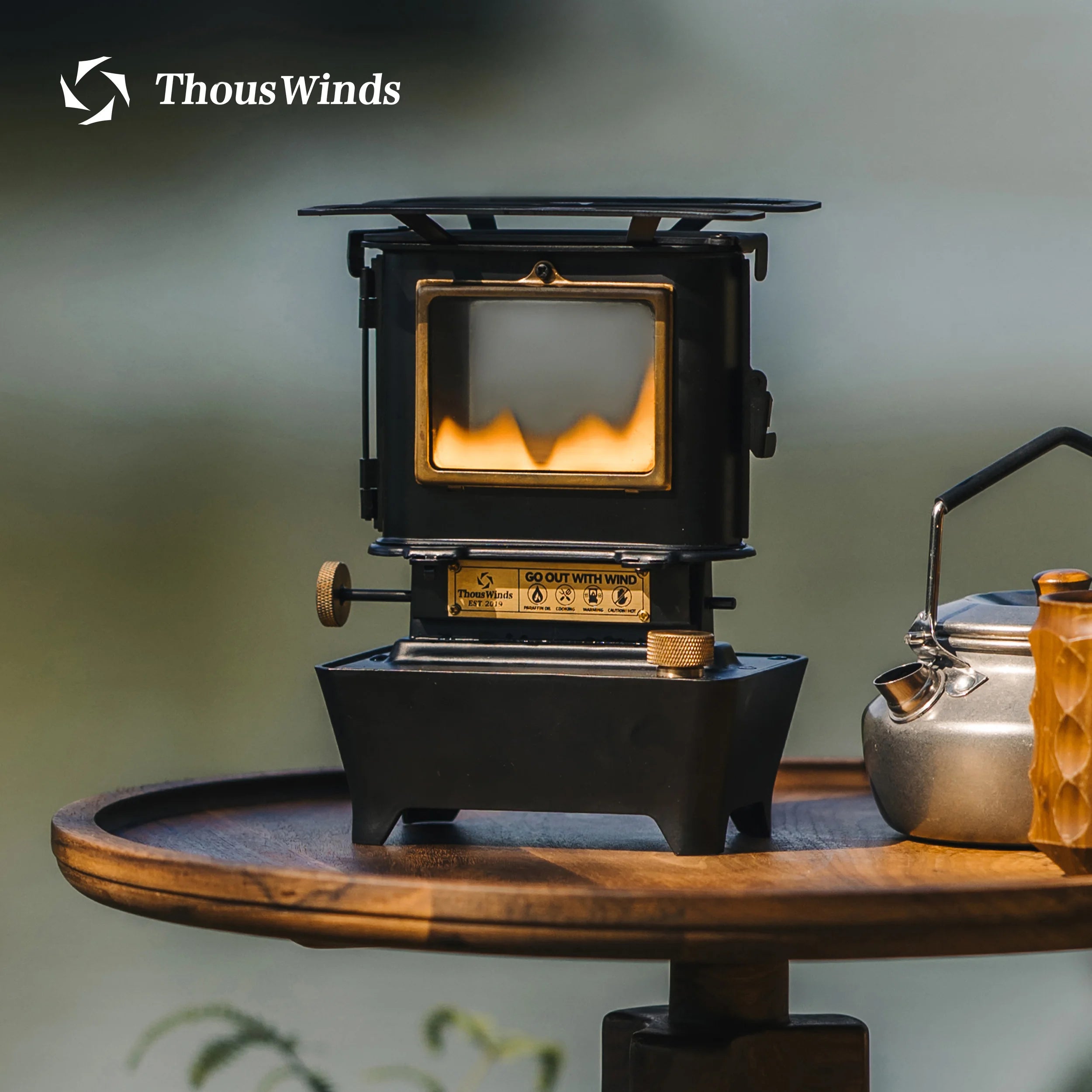 A chic, vintage-inspired Firedance Oil Lamp Stove carefully crafted from SUS304 stainless steel and brass. It features a 400ml fuel capacity and emits a warm, inviting glow, perfect for outdoor camping or indoor decor. This versatile and stylish piece of homeware is conveniently sized for both functional use and storage. Available in classy black and luxurious brass options. The item weighs 1705g, demonstrating its robustness and durability. A wonderful fusion of style, convenience, and practicality.