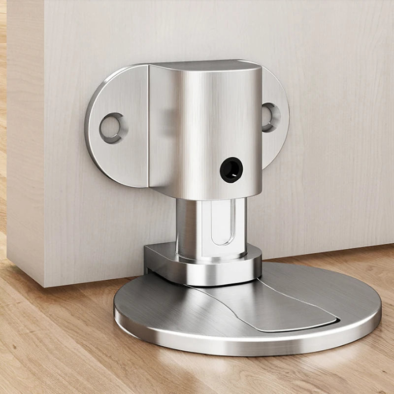 A high-quality Magnetic Doorstop made of durable zinc alloy metal and finished with brushed stainless steel, resistant to corrosion and rust. Featured with a robust magnetic attraction to securely hold doors, protecting them and the walls from wind damage. The product is easy to install and adaptable to different door gaps, suitable for wood, glass, metal, marble wall, composite materials, ideal for home and office use. 