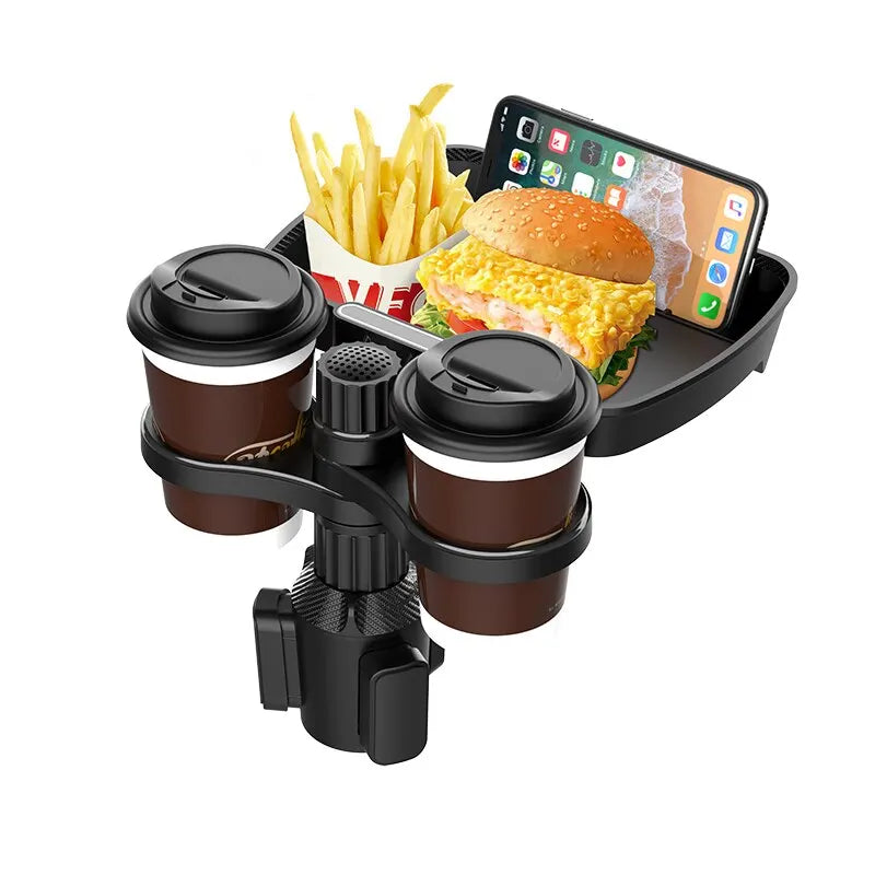 A vehicle interior showcasing a 360-degree rotating dual cup holder fixed on the car's center console. The cup holder tray with swivel base is designed to hold two drinks and doubles as a snack tray