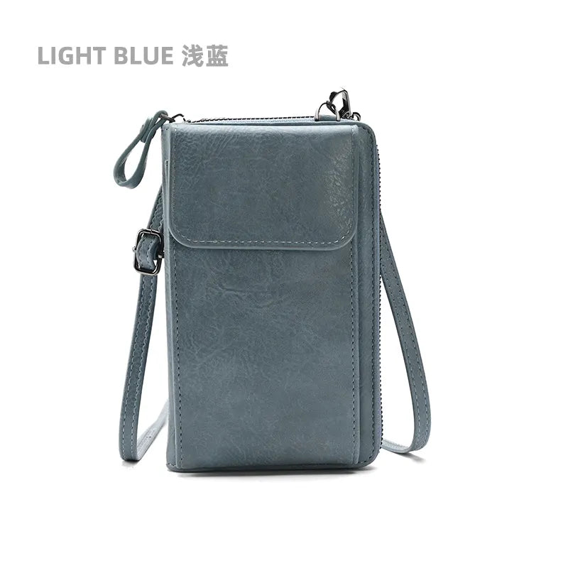  Cloud Discoveries Petite Crossbody Messenger - Mobile Chic: A versatile and stylish small handbag with phone pouch, card holder, and coin purse.